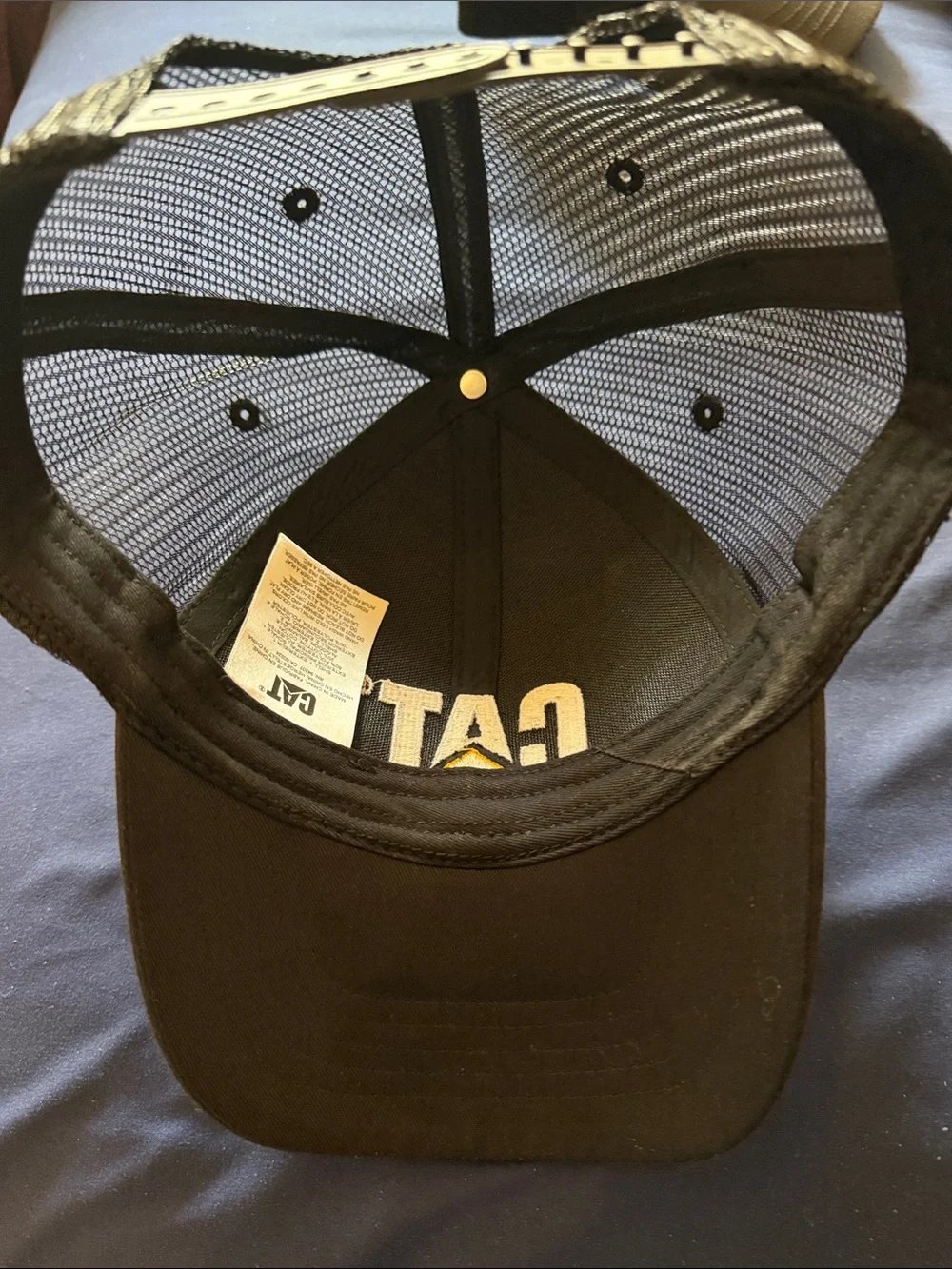 Caterpillar Black Trucker Hat with Yellow Logo